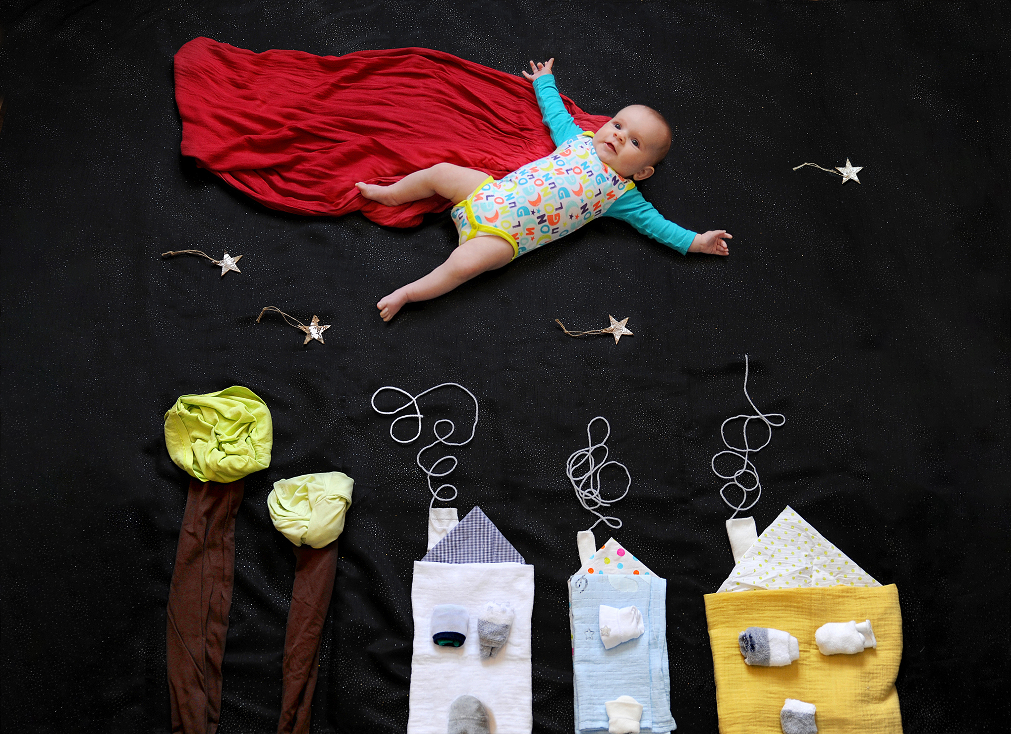 Séance photo bébé rêveur super héro
